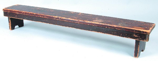 Brown Painted Softwood Prayer Bench having front s: Brown Painted Softwood Prayer Bench having front side skirt and arch cut out legs, 7 ½"h. x 48"l. x 7"d. Condition: Good with paint wear.