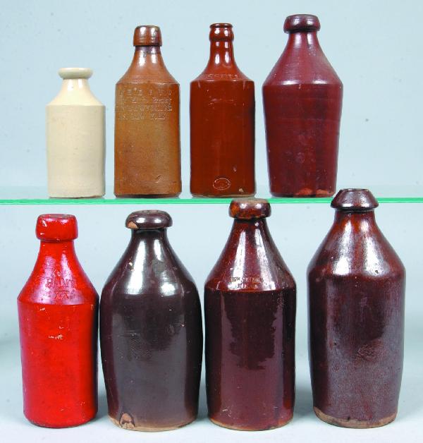 Eight Various Stoneware and Redware Pottery Salt G: Eight Various Stoneware and Redware Pottery Salt Glazed Bottles, some with impressed names; RUSSELL, SARDINS, HAM'S XX, Wm. EDES. 5-3/4" to 9-3/4" high. Condition: some chips.