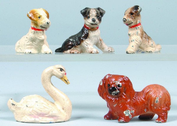 Five Various Hubley Cast Iron Animal Place Card Ho: Five Various Hubley Cast Iron Animal Place Card Holders (4 dogs and 1 swan), all with original paint.1-1/4" to 1-1/2" high. Condition: Good with some paint chips.