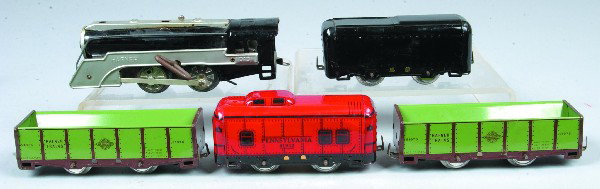 Hafner Freight Train Set; 1010 Loco, black, clockw: Hafner Freight Train Set; 1010 Loco, black, clockwork working w/Key, Tender Gondola, 2 Reefers and a Caboose. Condition: Very Good.