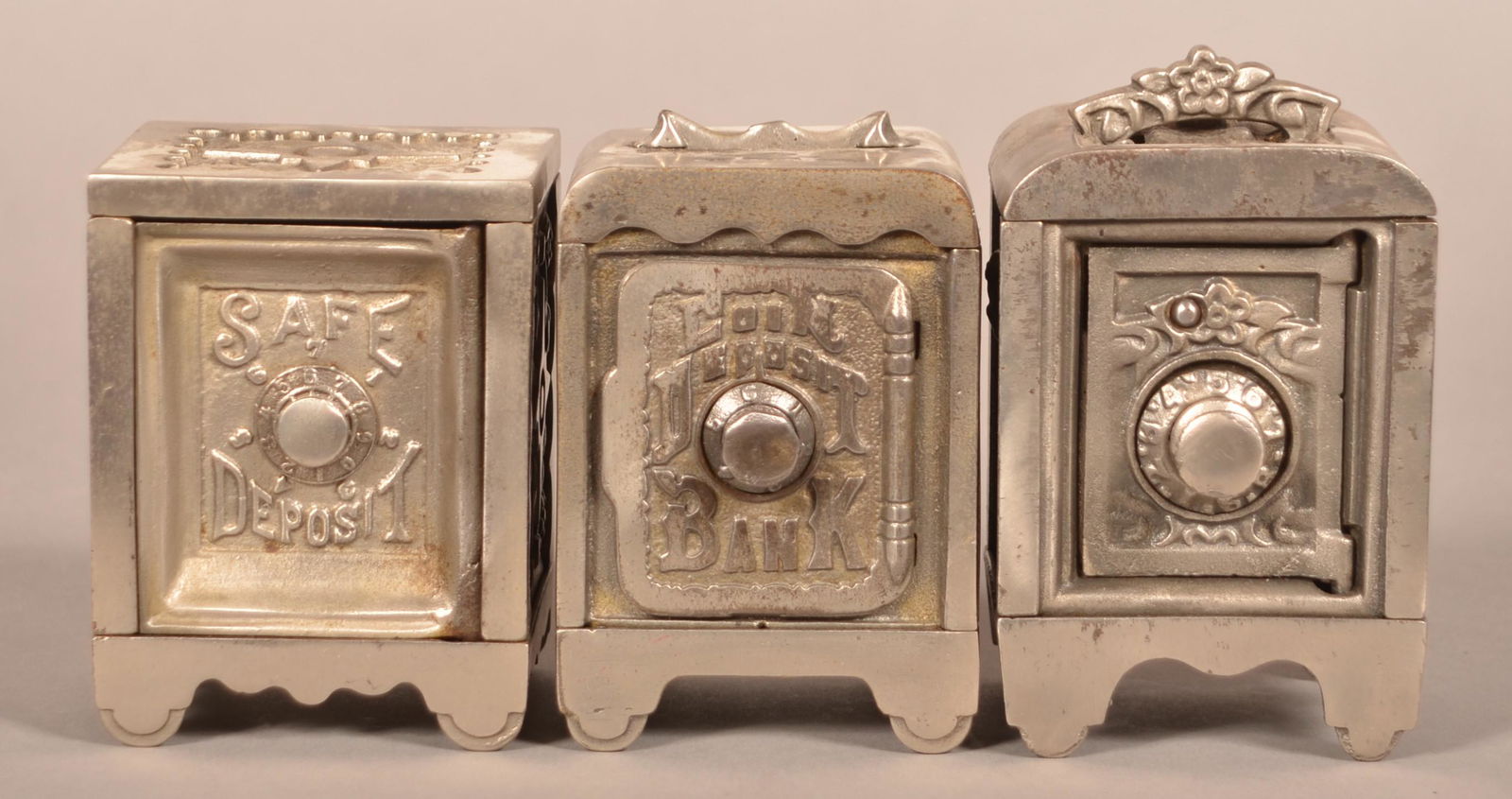 Three Antique Cast Iron Safe Still Banks. (1 of 4)