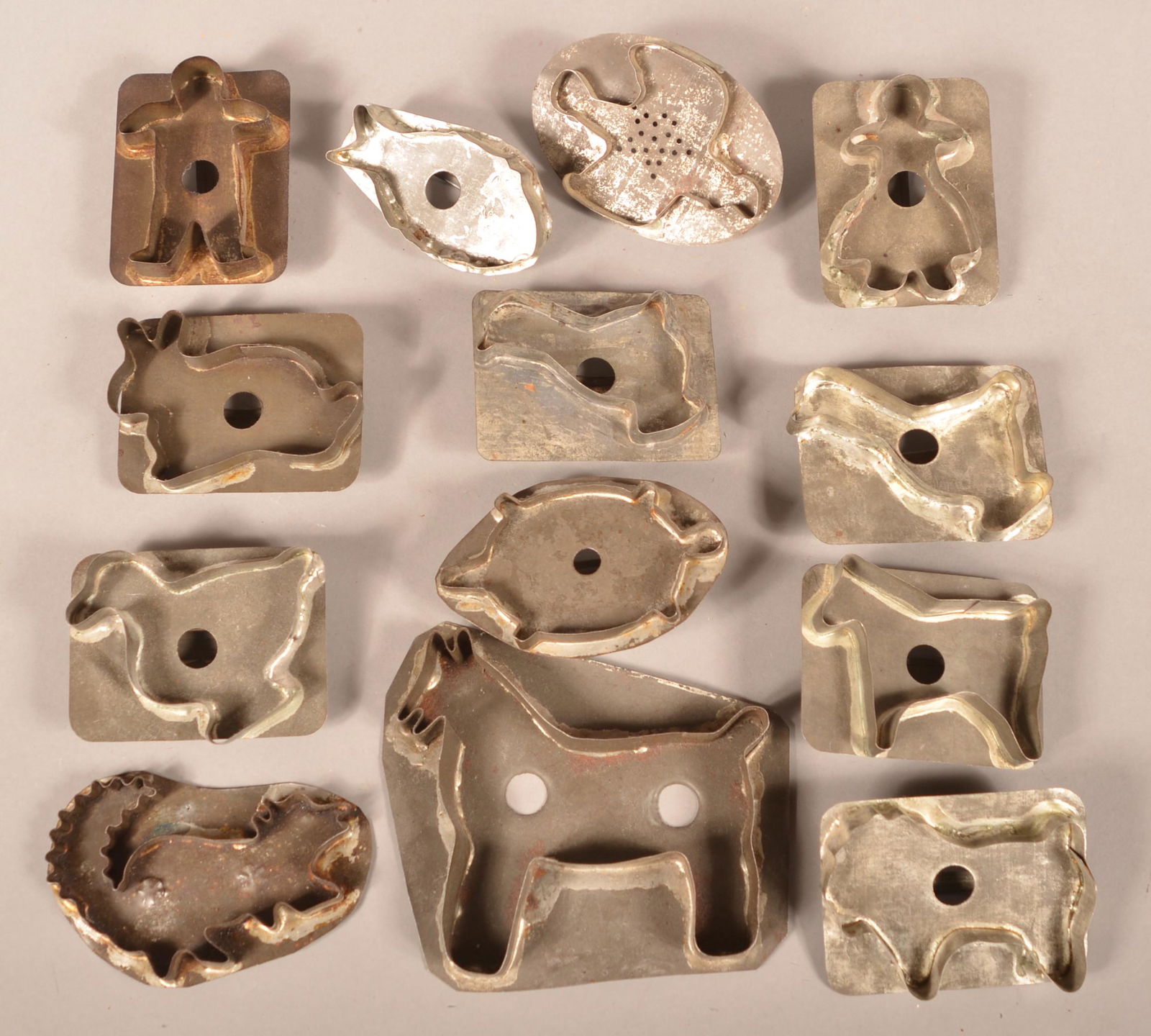 Thirteen Various Antique Figural Tin Cookie Cutters. (1 of 2)