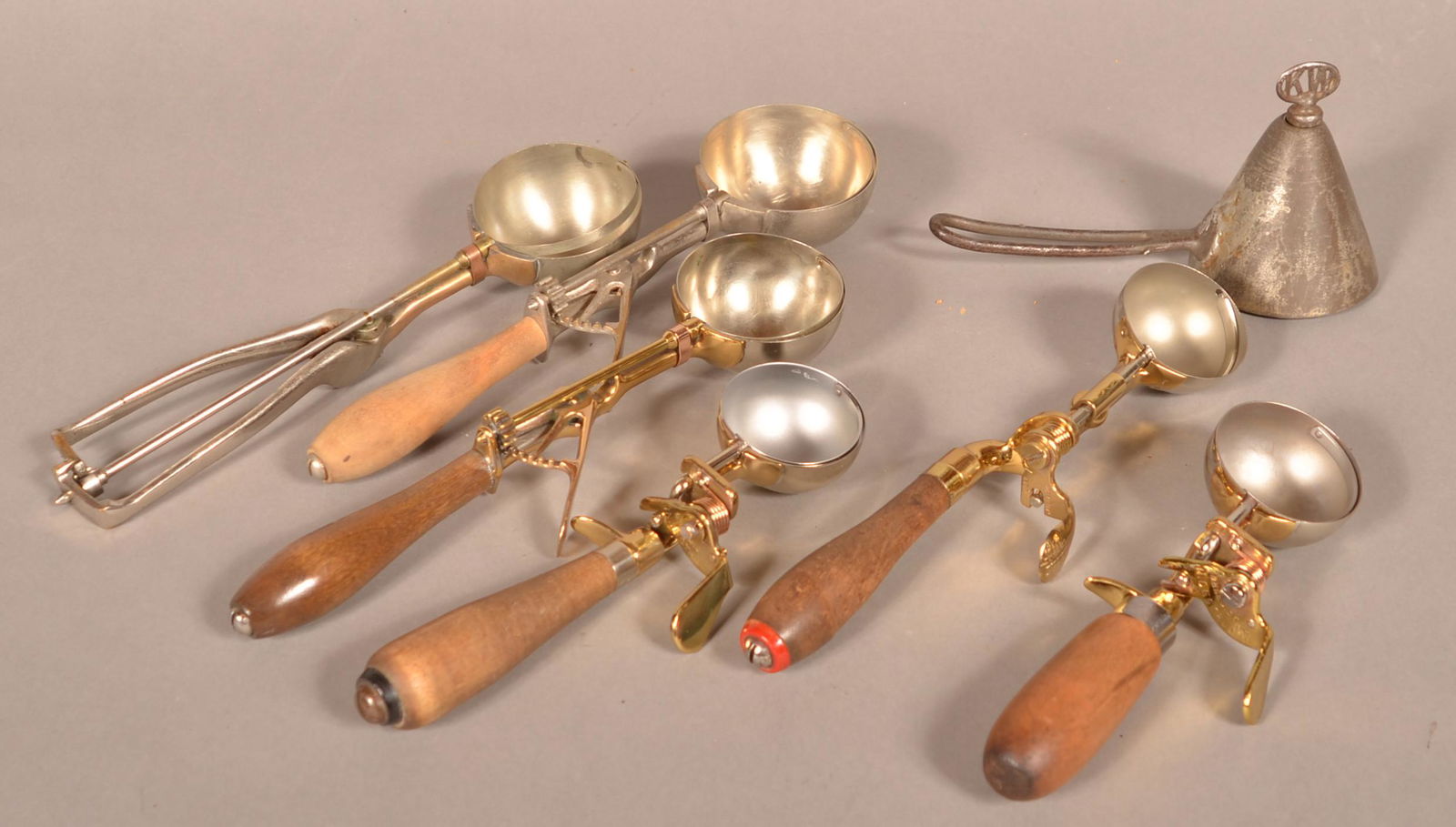 Seven Various Antique Ice Cream Scoops. (1 of 5)