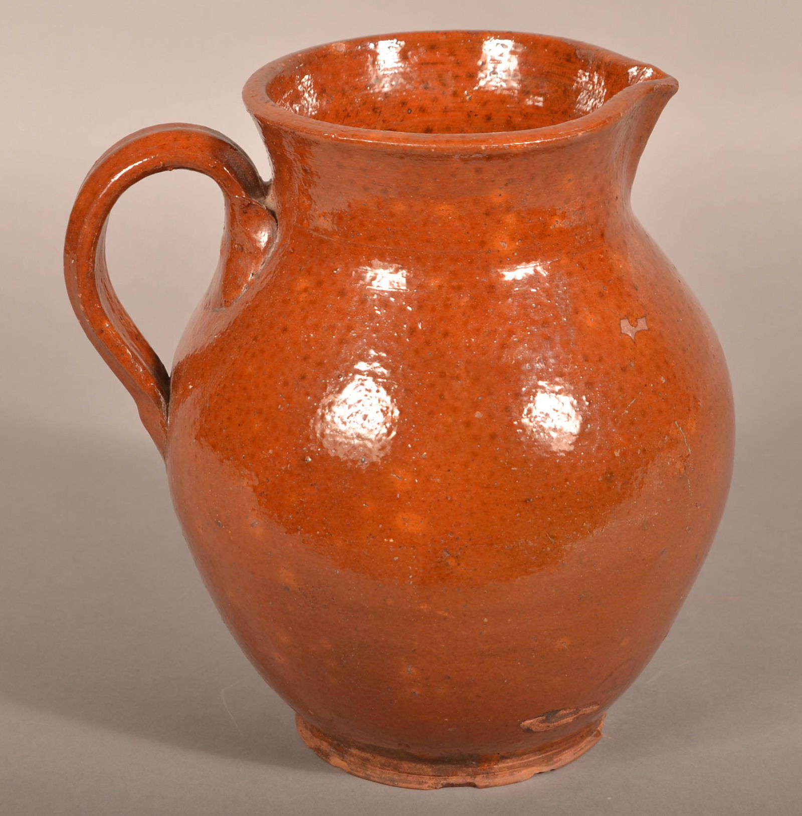 19th Century Redware Speckle Glazed Pitcher. (1 of 4)