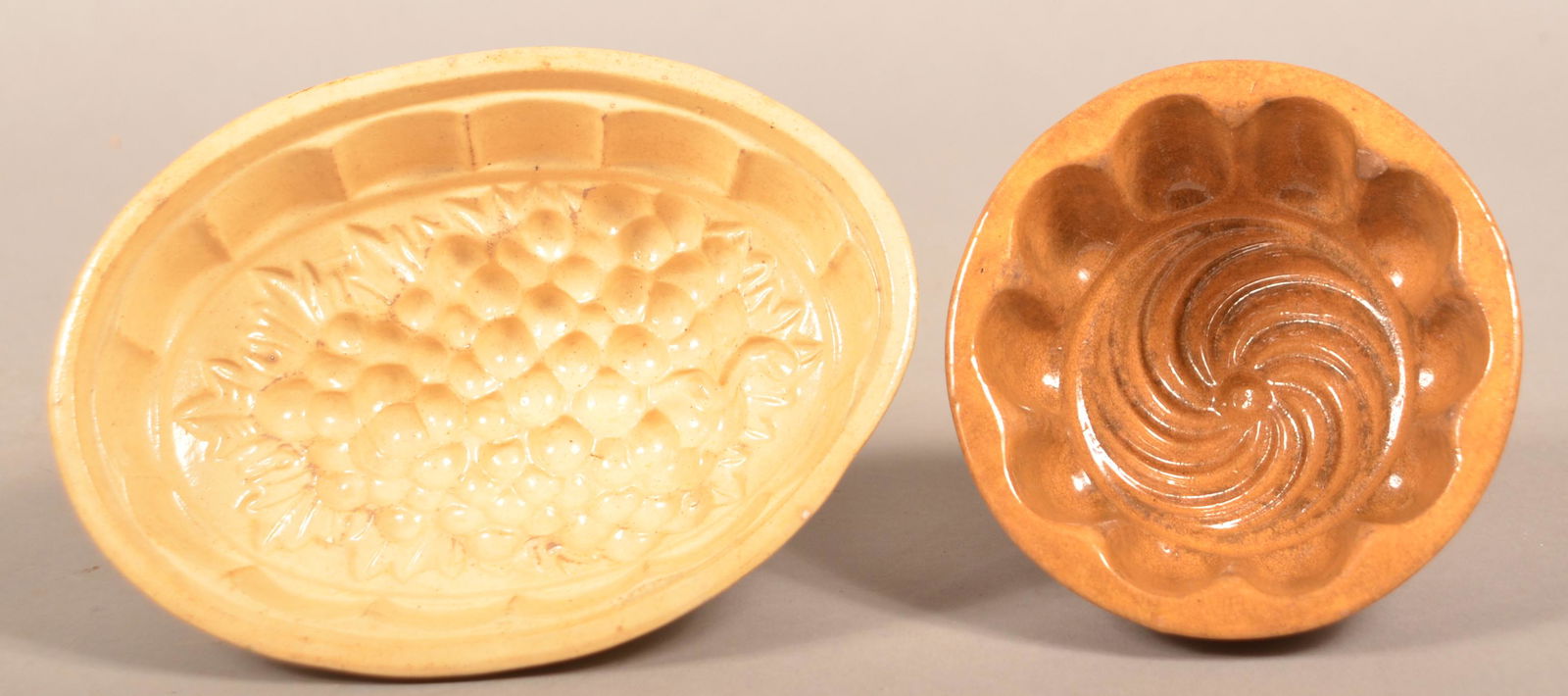 Two Unsigned Antique Yellowware Food Molds. (1 of 3)