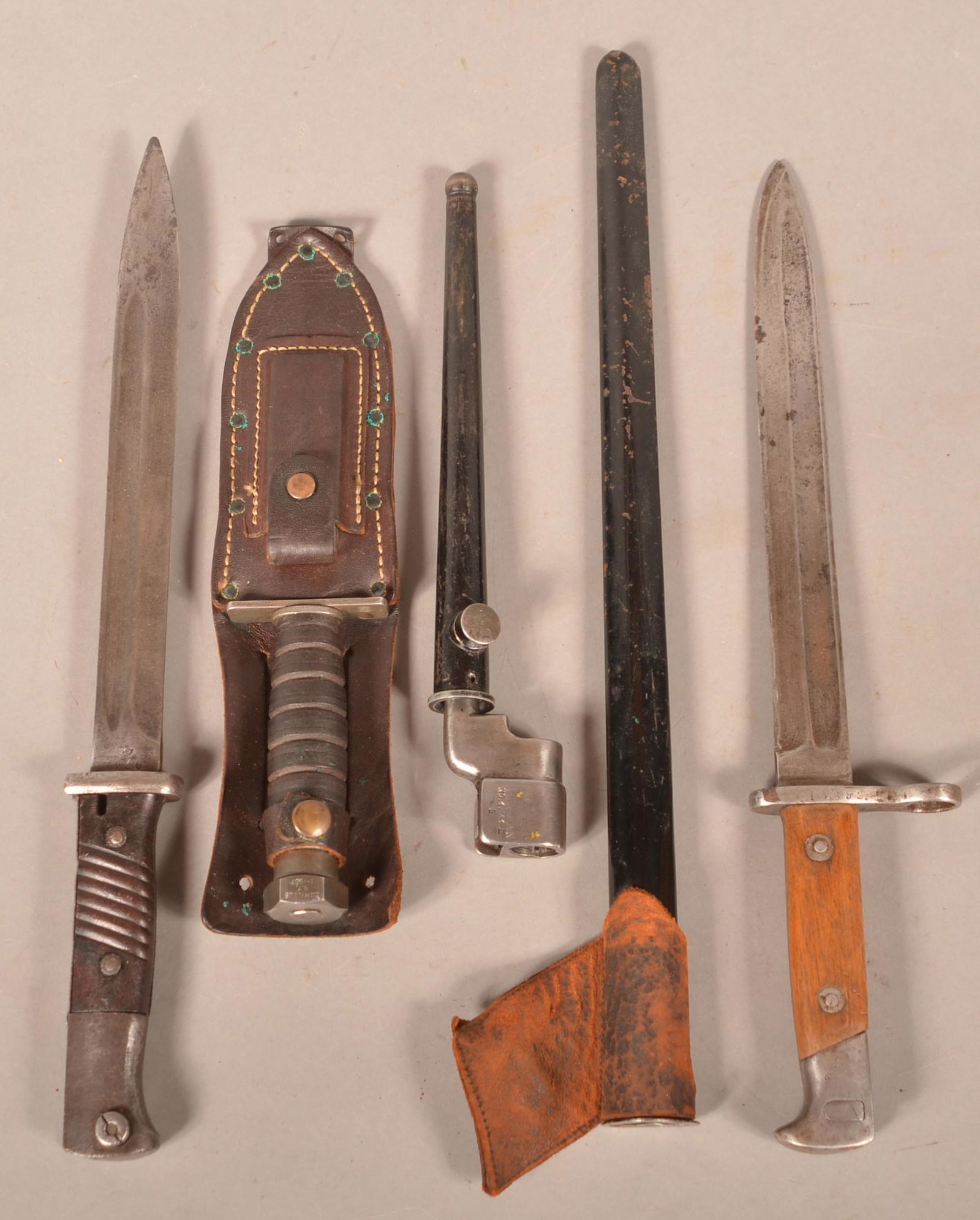 Three Bayonets and One Fighting Knife. (1 of 2)