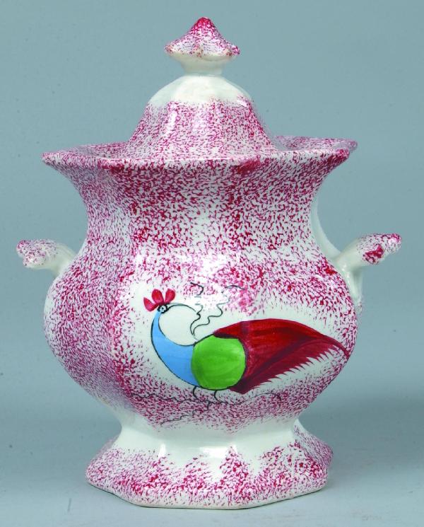 Red Spatter Ironstone China Peafowl Pattern Panele: Red Spatter Ironstone China Peafowl Pattern Paneled Covered Sugar Bowl. Double sided blue, green and red peafowl, impressed Adams. 7-3/4" high. Condition: Lid professionally repaired.