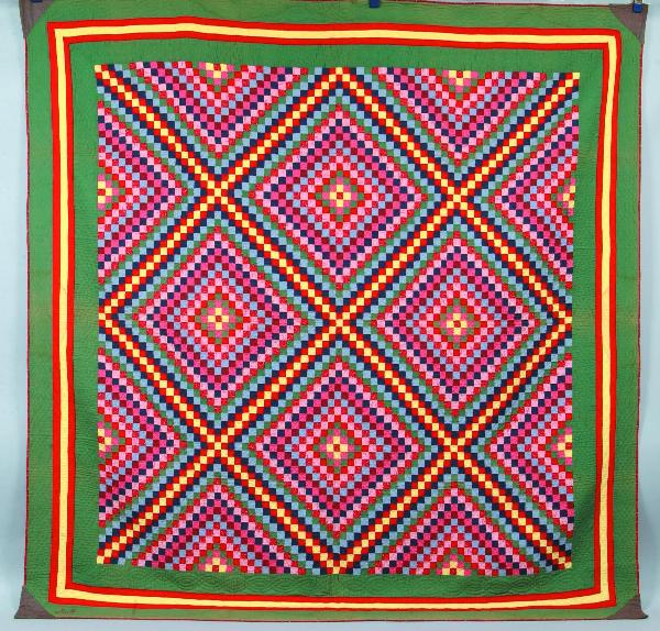 Sunshine and Shadow Variant Patchwork Quilt, color: Sunshine and Shadow Variant Patchwork Quilt, colorful 1" square patches on green ground, double border in red and yellow, initialed A.N., 84' x 88",Condition: Good with fading.