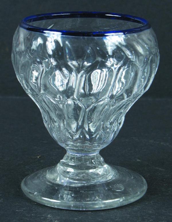 Stiegel-type Blown Colorless Glass Honeycomb Patte: Stiegel-type Blown Colorless Glass Honeycomb Pattern Footed Master Salt with cobalt blue rim. Leaded Glass with bulbous body, applied pedestal base with broken pontil. 3-1/8" high. Condition: Very goo
