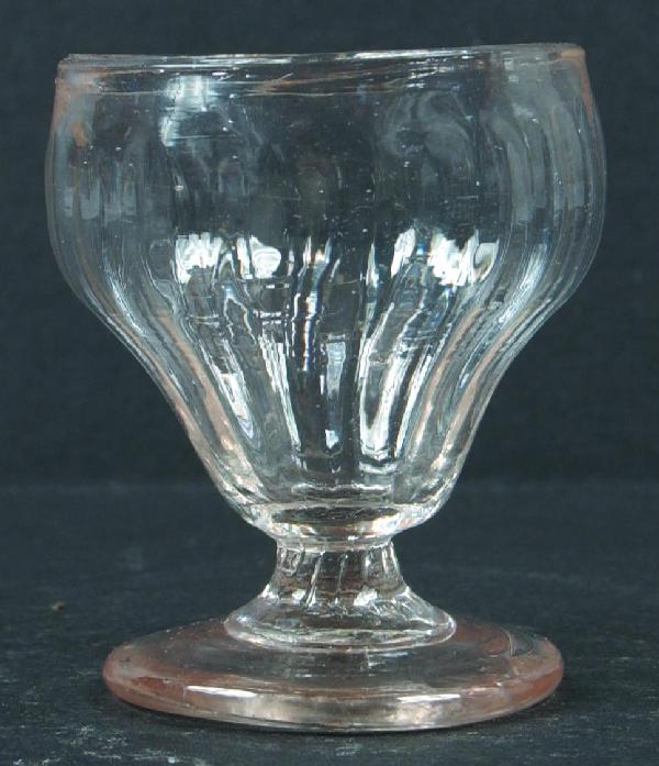 Stiegel-type Colorless Glass Vertical Rib Pattern : Stiegel-type Colorless Glass Vertical Rib Pattern Blown Glass Footed Master Salt. Leaded Glass with bulbous body, applied pedestal base with pontil mark. 3" high. Condition: Very good.