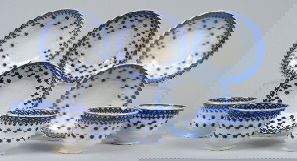 Five Various Flow Blue Snowflake Pattern Ironstone: Five Various Flow Blue Snowflake Pattern Ironstone China Handleless Cups and Saucers. Condition: Good, one cup with hairline.
