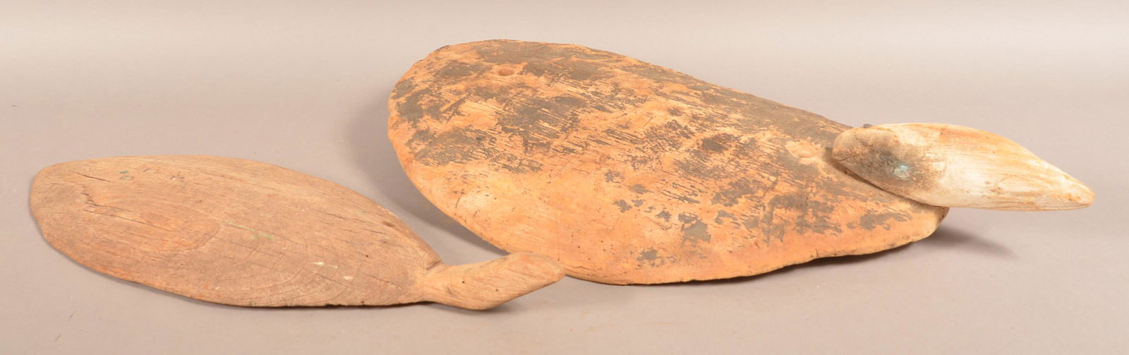 Two Primitive Antique Folk Art Softwood Turtle Decoys.: Two Primitive Antique Folk Art Softwood Turtle Decoys. 25"l. and 29"l. Condition: Fair with weathering and wear.