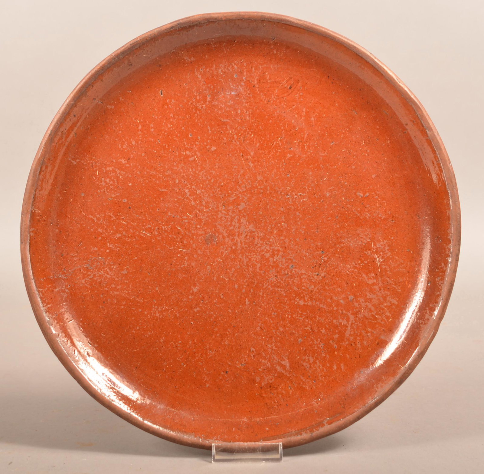 Scarce John Bell Glazed Redware Charger.: Scarce John Bell Glazed Redware Charger. Stamped "John W. Bell Waynesboro, Pa". 12-1/2" diam. Condition: Very good with surface wear.