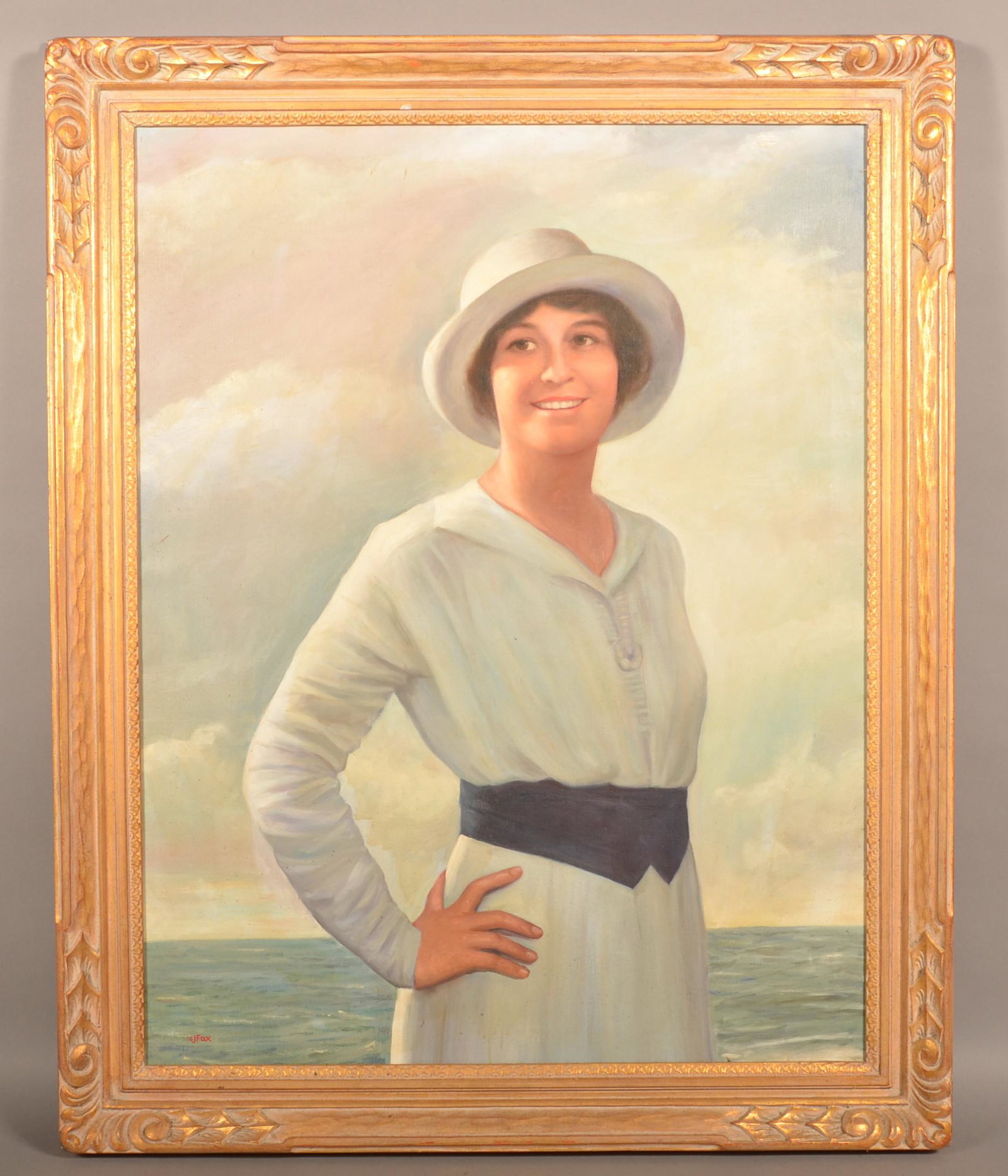Charles J. Fox Portrait Painting of a Young Lady.: Charles J. Fox Portrait Painting of a Young Lady. (American, 20th Century). Signed lower left "C.J. Fox". Oil on canvas 3/4 length portraying of a woman by the sea. In a period carved wood frame, 42-1