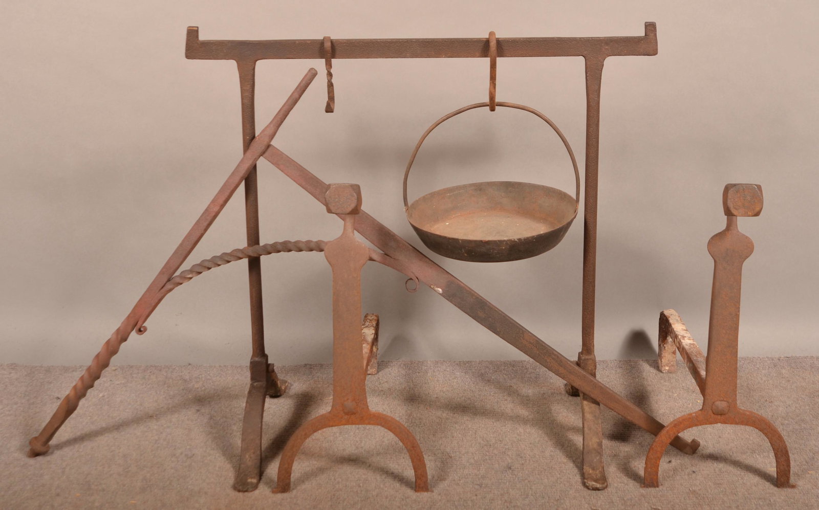 Lot of 18th/19th Century Iron Hearth Equipment.: Lot of 18th/19th Century Iron Hearth Equipment. Including andirons, crane, trestle, etc. Crane 37-1/2"l. Condition: Good with rust and pitting.