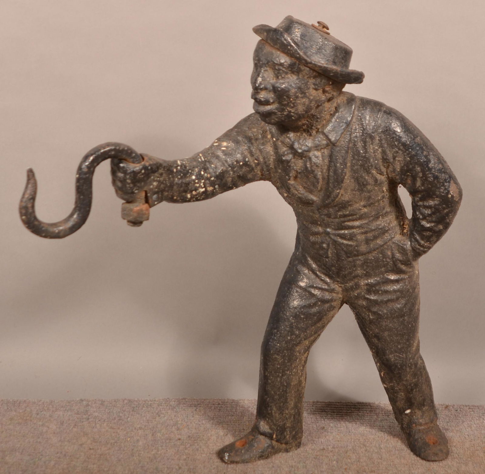 Cast Iron Black Americana Lantern Jockey.: Cast Iron Black Americana Lantern Jockey. Circa 1900. 24''h. Condition: Good with pitting and wear.