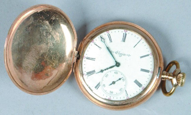 Elgin Pocket Watch, movement marked Fred J. Dorn B: Elgin Pocket Watch, movement marked Fred J. Dorn Buffalo, N.Y., 15 jewels, #10833016,incised bird and shield decorated 25 year case, running, Condition: Good.