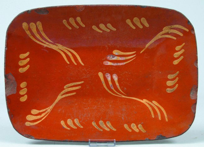 Redware Slip Decorated Loaf Dish with yellow slip: Redware Slip Decorated Loaf Dish with yellow slip decorated, 10-3/8" x 14-5/8"dia. Condition: Chips.