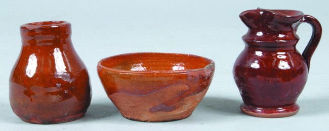 Three Miniature Redware Pieces, 2-3/4" Vase, 3-1/4: Three Miniature Redware Pieces, 2-3/4" Vase, 3-1/4"dia.Bowl and Pinched Spout 3"h. Pitcher, Condition: chip on vase.