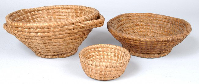 Lot of Three Rye/Straw Coil Baskets; Footed splaye: Lot of Three Rye/Straw Coil Baskets; Footed splayed sides with open handles fruit basket, 6"h x 13"diam., footed with splayed sides sewing basket, 4"h x 12"diam. And small round basket, 2 1/2"h x 6"di