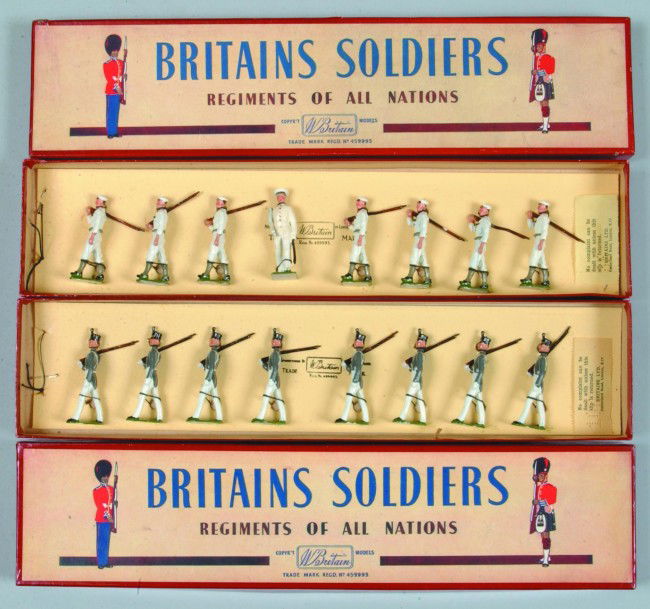 Two Britains Boxed Sets; West Point Cadets, summer: Two Britains Boxed Sets; West Point Cadets, summer uniforms No. 299 and United States Navy, white jackets marching with Officer No. 1253. Condition: Both are good.