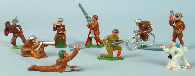 Lot of Nine Manoil and Barclay Cast and Painted Lea: Lot of Nine Manoil and Barclay Cast and Painted Lead U.S. Soldiers; Bicycle Dispatch Rider (M79), Navy Gunner (M76), Machine Gunner Sitting (M41), Sitting Soldier Eating (M84), Soldier with Shell for 