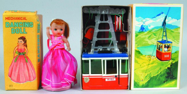 Two Various Toys with original boxes; MITU, Japan: Two Various Toys with original boxes; MITU, Japan Mechanical Dancing Doll, 6 1/2" high and Rigi, Western Germany Nr. 900 Tramway Cable Car, 8" high. Condition: Both Very good, boxes show some wear.