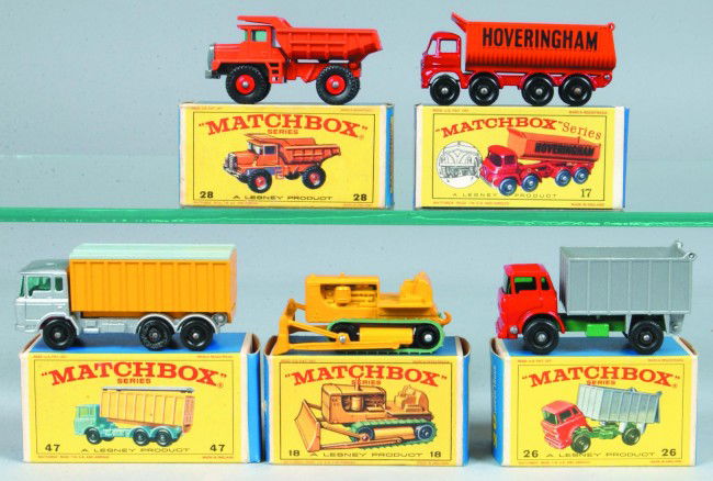 Five Matchbox Vehicles by Lesney, all with origina: Five Matchbox Vehicles by Lesney, all with original boxes; 17 8-wheel Tipper, 18 Caterpillar Bulldozer, 26 G.M.C. Tipper Truck, 28 Mack Dump Truck, 47 D.A.F.Tipper Container Truck. Condition: Very goo