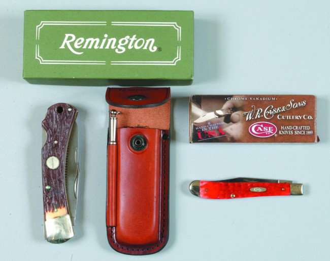 Two Various Knives; Remington R3 Big Game Knife wi: Two Various Knives; Remington R3 Big Game Knife with leather sheath and sharpening stick, plus a Case #06982 Red Stag Utility Knife. Condition: Both new in box with papers.
