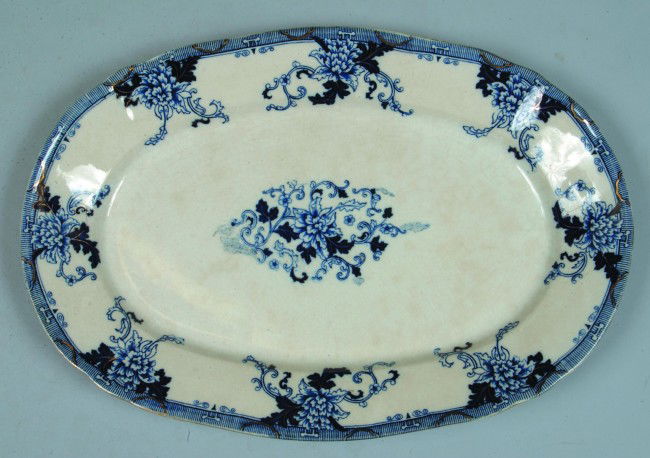Flow Blue Ironstone China 18 1/2" Platter with flo: Flow Blue Ironstone China 18 1/2" Platter with floral transfer decorations, unmarked, Condition: Good.