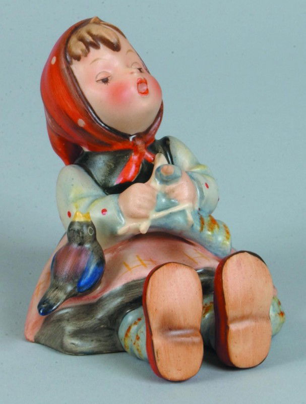 "Happy Pastime" Hummel Figurine, # 69 with TMK 2,: "Happy Pastime" Hummel Figurine, # 69 with TMK 2, 3 1/4"h. Condition: Good.