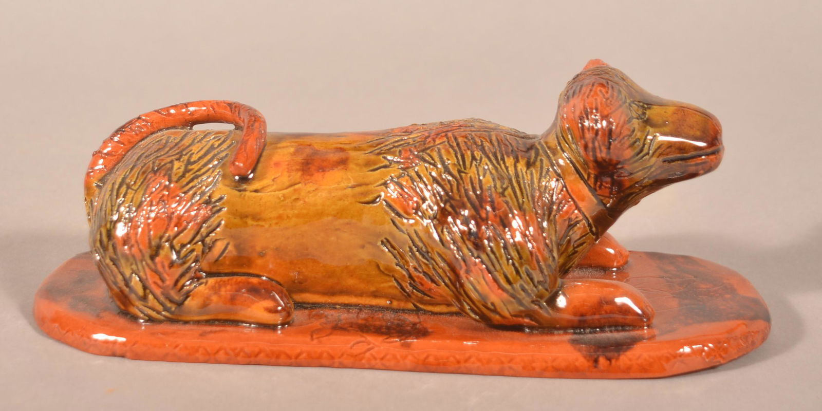 Breininger Pottery 1980 Glazed Reclining Dog Figure. (1 of 3)