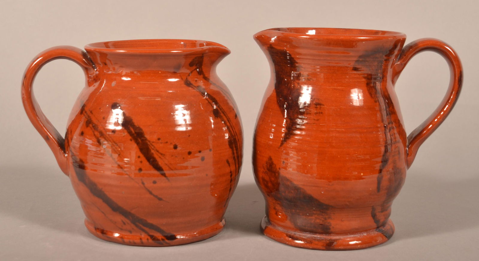 Two Breininger Pottery Mottle-Glazed Pitchers. (1 of 3)