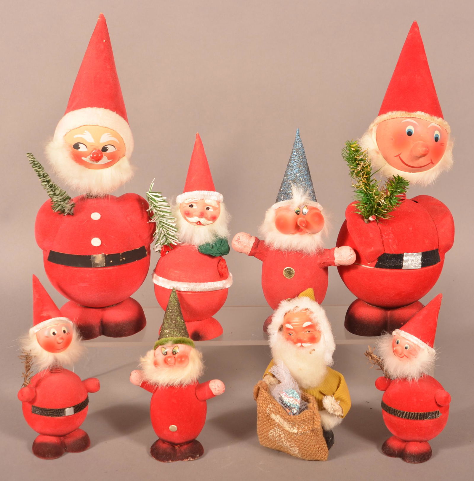 Eight Vintage Santa Nodder Candy Containers. (1 of 2)