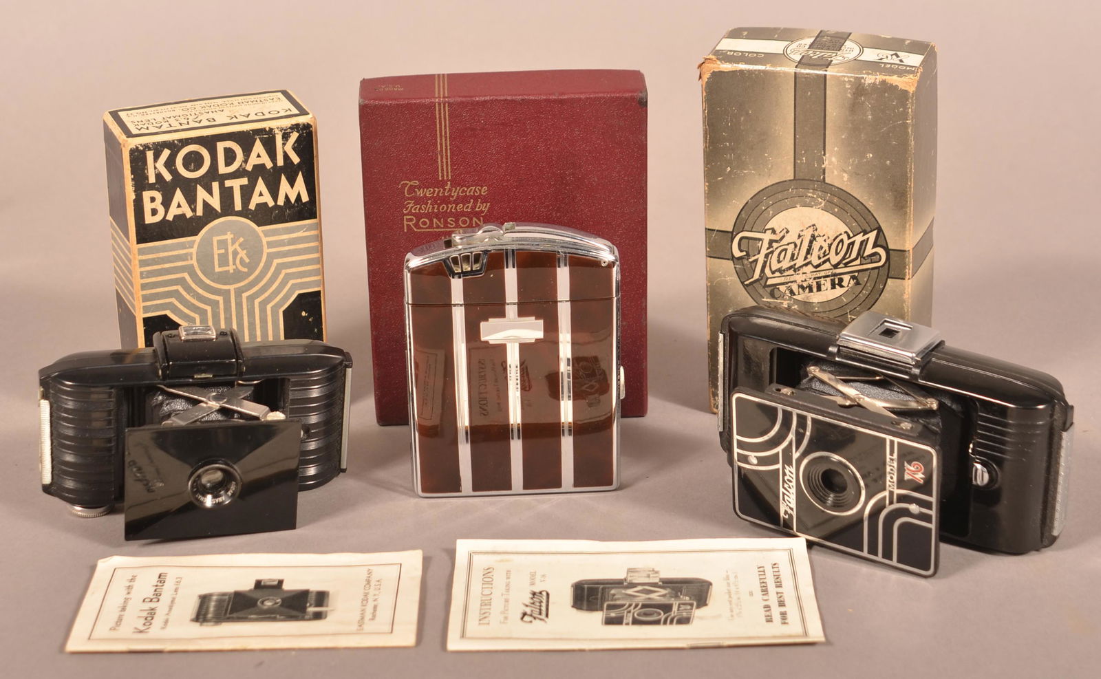 Two Art Deco Cameras and a Cigarette Case/Lighter. (1 of 2)