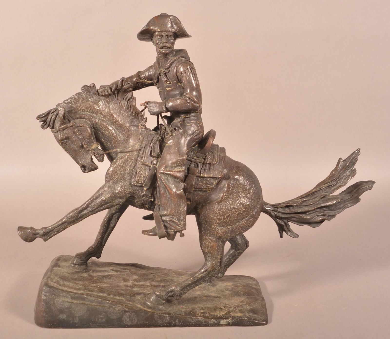 After Frederick Remington "Cowboy" Bronze Sculpture. (1 of 5)