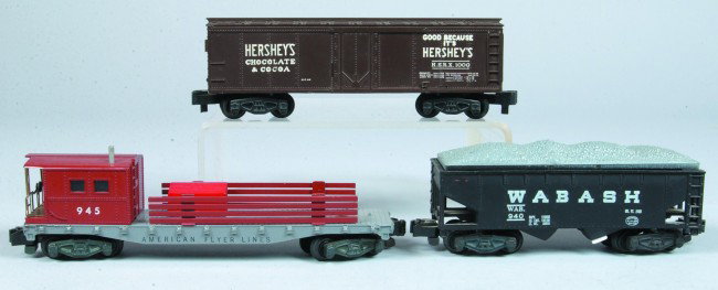 Lot of 3 American Flyer Rolling Stock with original: Lot of 3 American Flyer Rolling Stock with original boxes, (circa 1952-57), #945 work caboose, #940 wabash hopper and Hershey's Chocolate box car. All cars in overall good condition, showing minor use