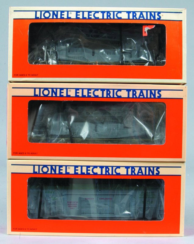 (3) Lionel Military Missile Launching Cars, (1992-9: (3) Lionel Military Missile Launching Cars, (1992-95). Two #6-1678 USMC cars, #6-16710 US Army car, all three cars are in like new condition with original boxes.