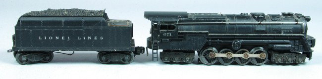 Lionel #671 Steam Locomotive with Whistle Tender (: Lionel #671 Steam Locomotive with Whistle Tender (Type 4), circa 1947. Overall good condition showing paint loss on locomotive body as well as normal use, wear and dirt on engine and tender.