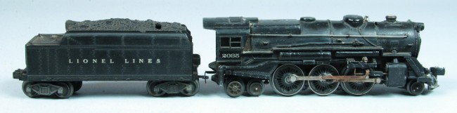 Lionel #2035 Steam Locomotive with 2466W Tender, (: Lionel #2035 Steam Locomotive with 2466W Tender, (Type 1). Tender contains original box, both pieces are in overall good condition showing normal use and wear. Engine appears to have paint touch-up wo