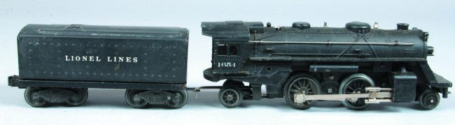 Lionel #1654 Steam Locomotive with #1654W Tender,: Lionel #1654 Steam Locomotive with #1654W Tender, (Type 1), circa 1948. Overall good condition having various paint loss, use and wear. Both pieces have original boxes, tender box with separation and