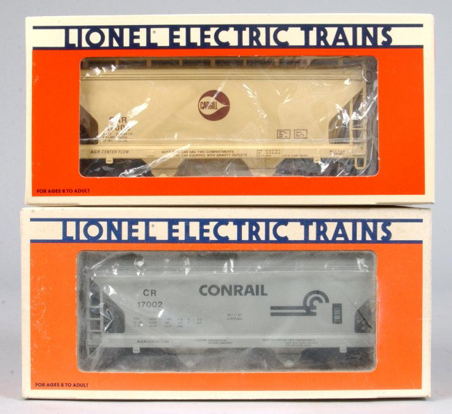 Two Lionel Covered Hopper, #6-17002 and #6-17005, : Two Lionel Covered Hopper, #6-17002 and #6-17005, overall great condition with original boxes showing some fading.