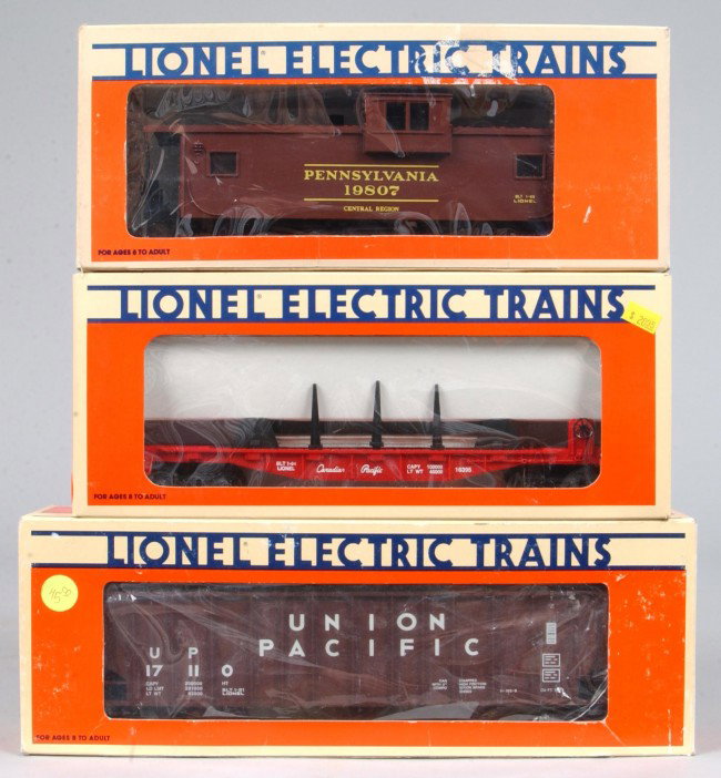 Lot of Three Lionel Train Cars, circa 1987-1991, #: Lot of Three Lionel Train Cars, circa 1987-1991, #6-19807 caboose, #6-16395 rail car, #6-17110 3-bay hopper, overall good condition with boxes showing various wear.