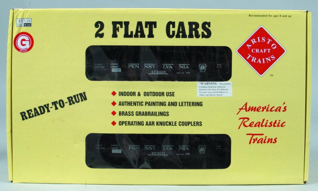 Aristo Craft G-scale P.R.R. 2 flat car set, cars a: Aristo Craft G-scale P.R.R. 2 flat car set, cars are in like new condition and feature brass grabrails and operating knuckle couplers