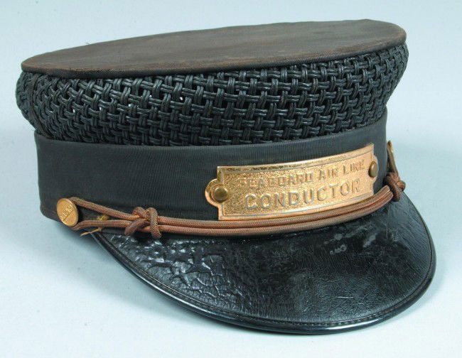 Seaboard Air Line Conductor Hat, size 7-1/8" hat w: Seaboard Air Line Conductor Hat, size 7-1/8" hat with brass name plate with two brass embossed buttons on either side of brim, hat has a wicker wrapped exterior with a black fabric top, in overall goo