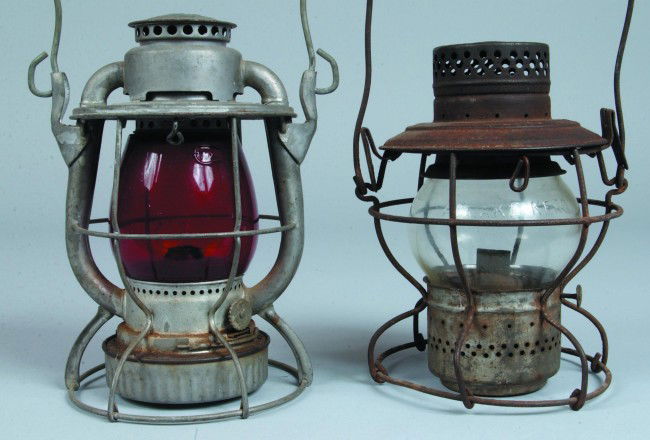 Dietz and Handlan RR Hand Lanterns. Dietz lantern: Dietz and Handlan RR Hand Lanterns. Dietz lantern has a red globe with R-LERR embossed on top, 10" high, loss to plated surface and having a bend to wire base. Handlan lantern has a PRR logo embossed
