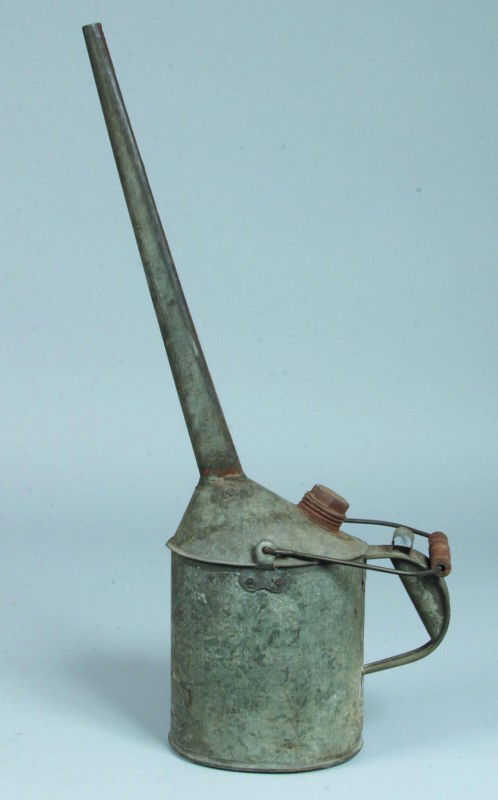 Large PRR Embossed Logo Oil Jug with Spout, 27-3/4: Large PRR Embossed Logo Oil Jug with Spout, 27-3/4" high to top of spout, good condition with wooden handle and zink finish, shows normal use, wear and some surface rust.