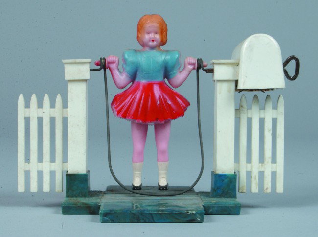 Jump Rope Girl, wind up, painted plastic, unknown : Jump Rope Girl, wind up, painted plastic, unknown maker, 5-1/2" x 7", good used.