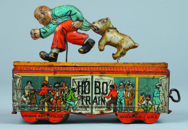 Hobo Train Wind-up, lithograph tin mfg. by Unique : Hobo Train Wind-up, lithograph tin mfg. by Unique Art Mfg. Co., Newark, NJ, 8" l. x 6" h., fair.