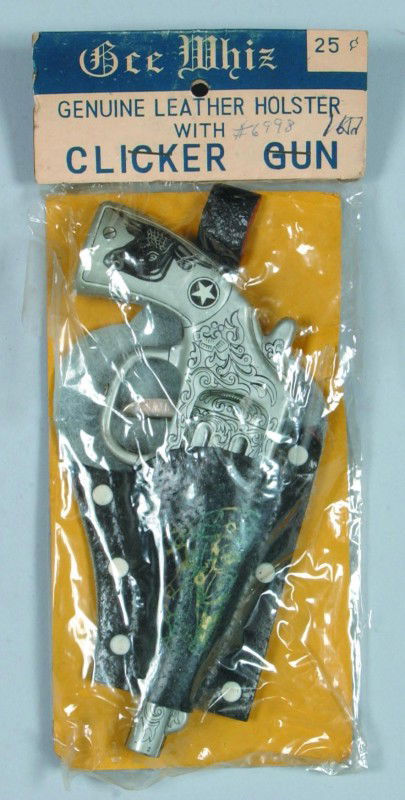 Gee Whiz Clicker Gun, with leather holster, in ori: Gee Whiz Clicker Gun, with leather holster, in original packaging, tin litho, made in Japan, 3-3/4" x 8-1/2", condition: very good; packaging, fair